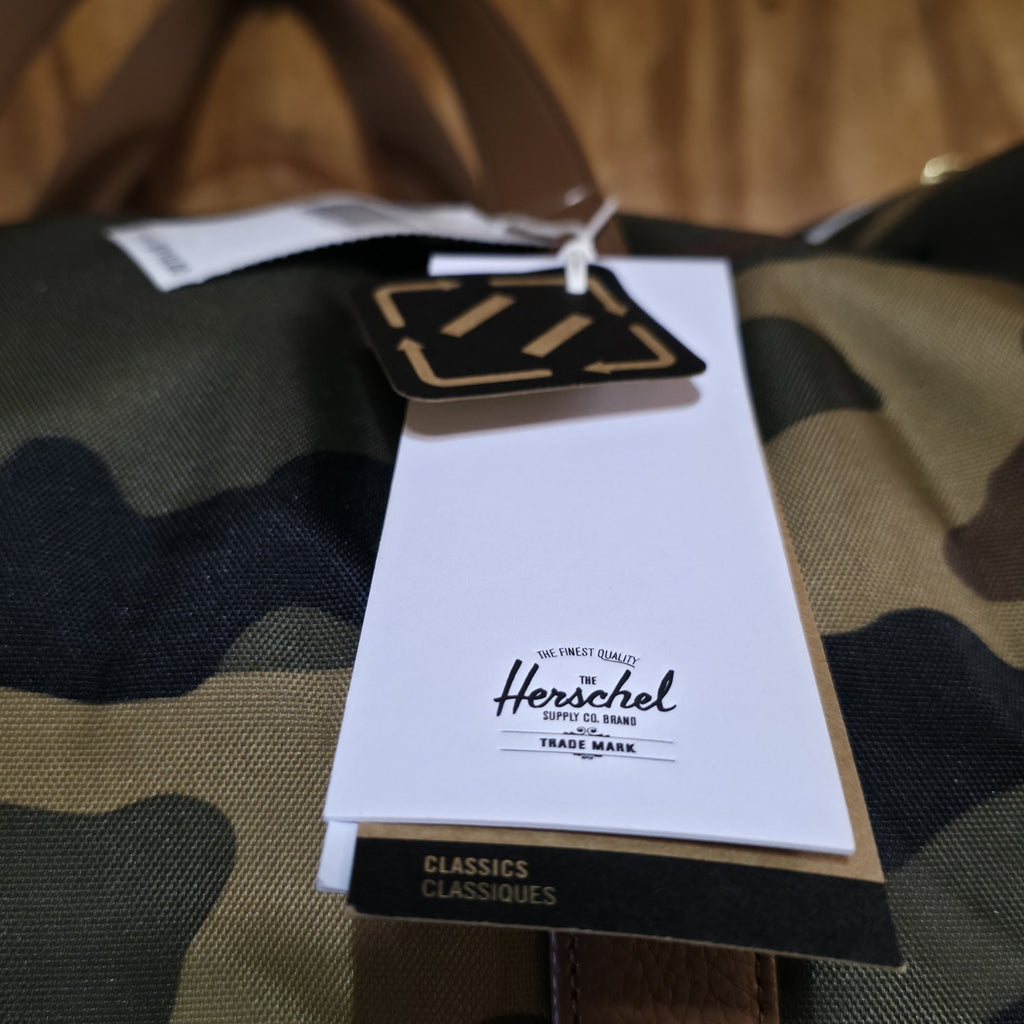 Herschel Novel Duffle Woodland Camo FAUX Leather and Shoulder Strap - DAD DENIM