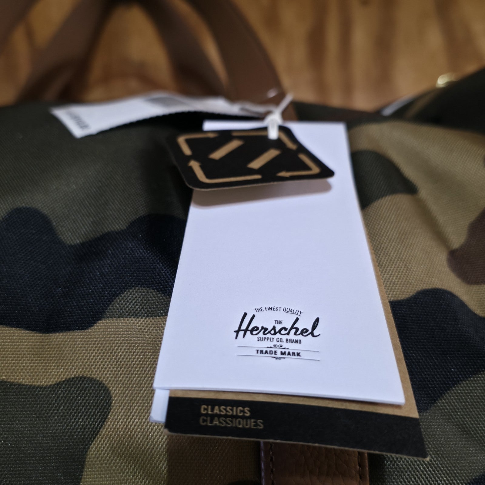 Herschel Novel Duffle Woodland Camo FAUX Leather and Shoulder Strap - DAD DENIM
