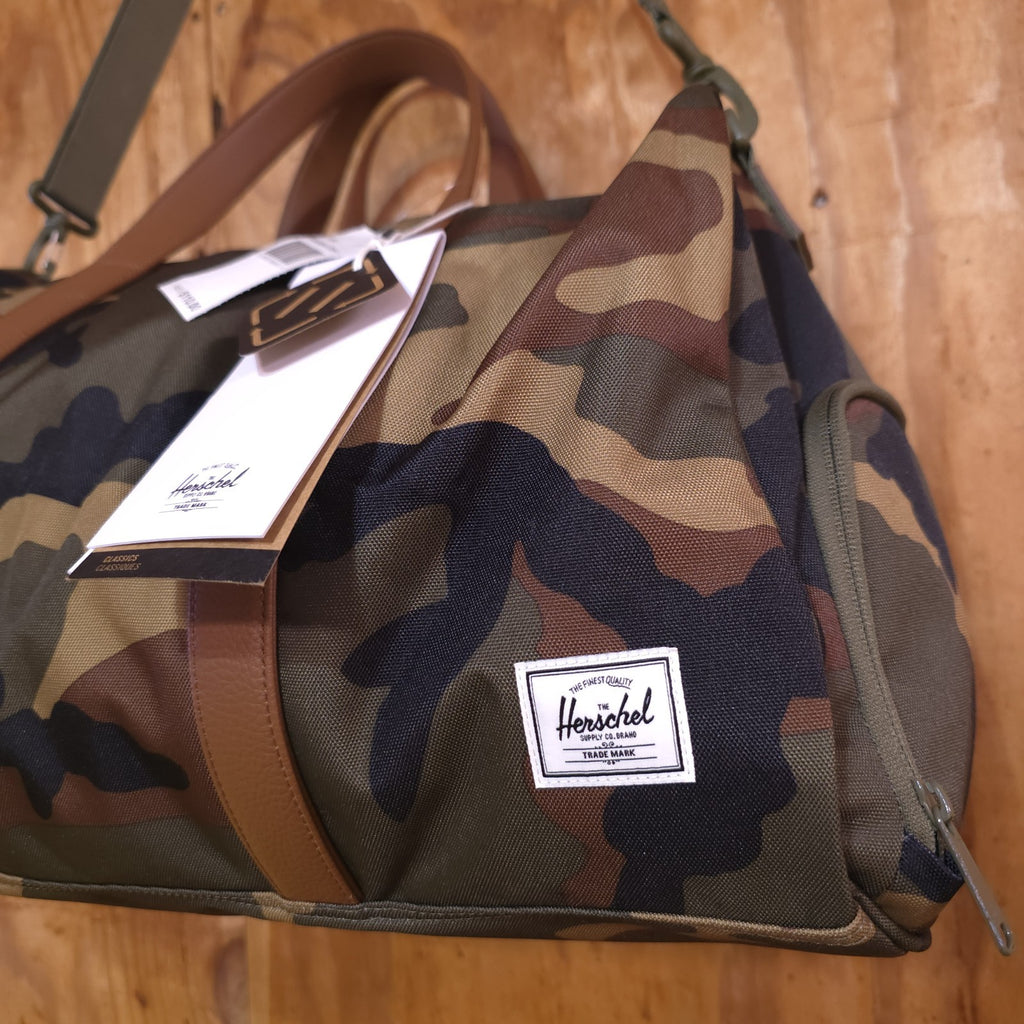 Herschel Novel Duffle Woodland Camo FAUX Leather and Shoulder Strap - DAD DENIM