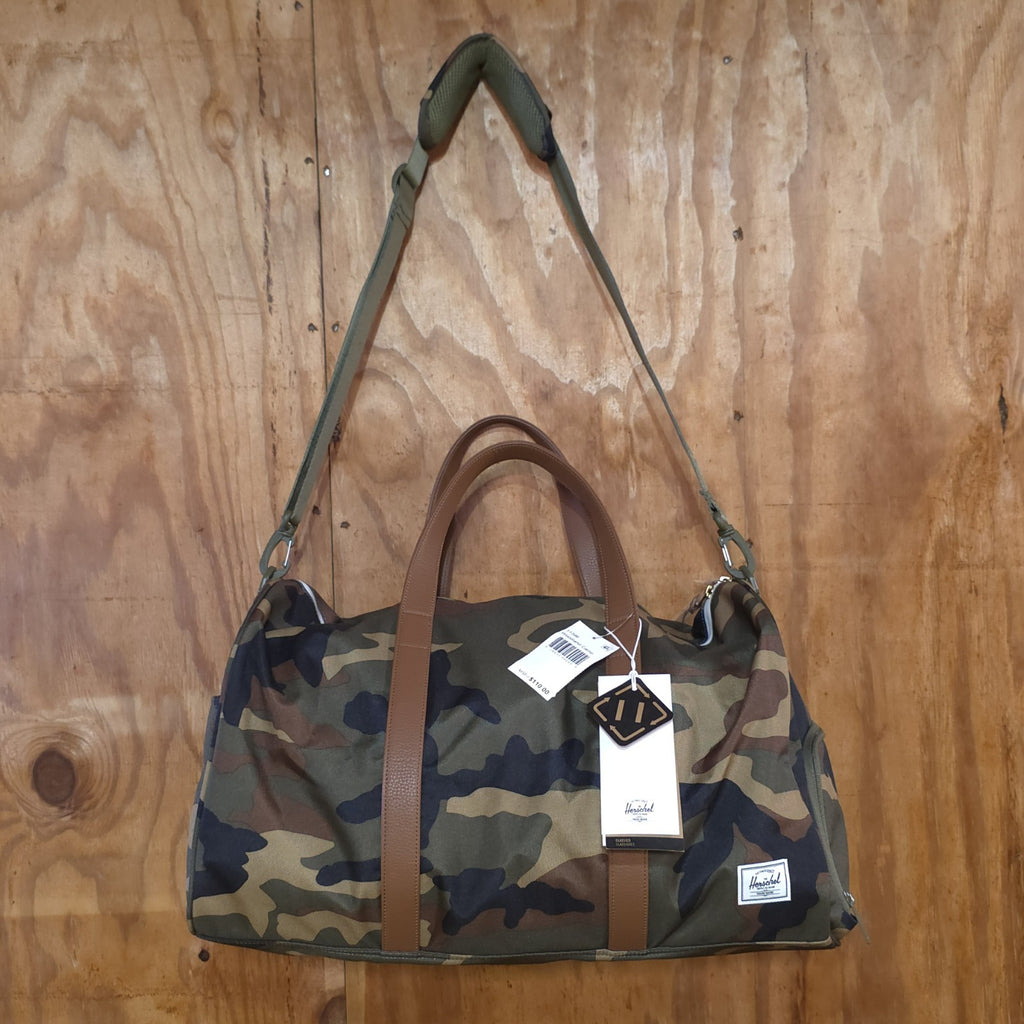 Herschel Novel Duffle Woodland Camo FAUX Leather and Shoulder Strap - DAD DENIM