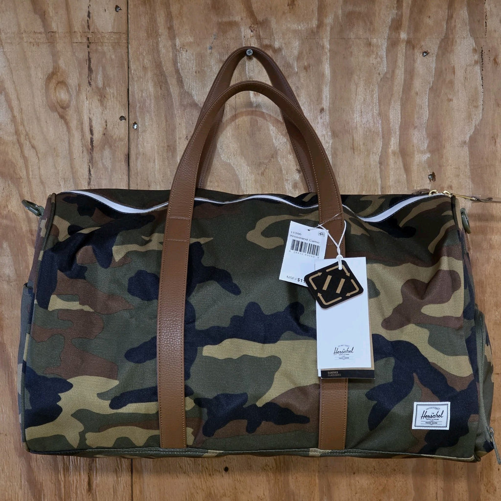 Herschel Novel Duffle Woodland Camo FAUX Leather and Shoulder Strap - DAD DENIM